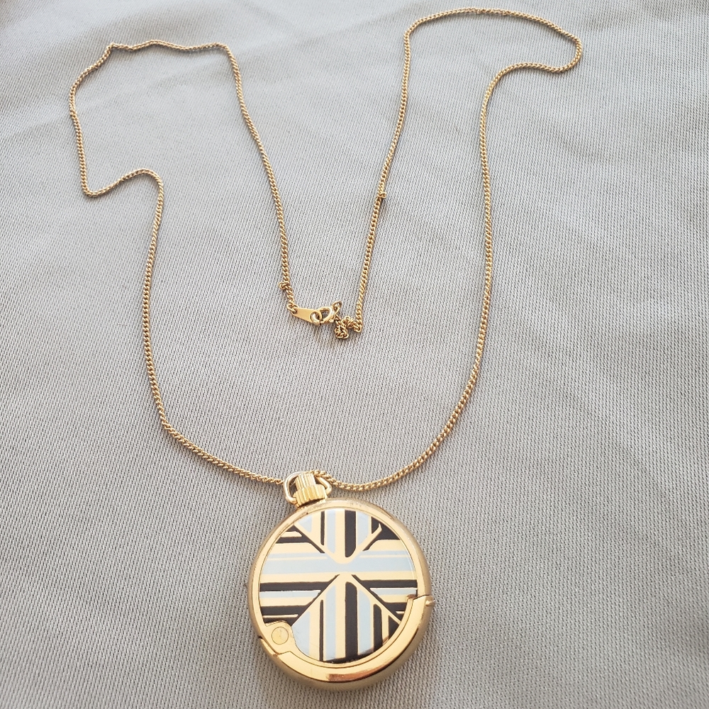 Golden necklace with hidden lighter